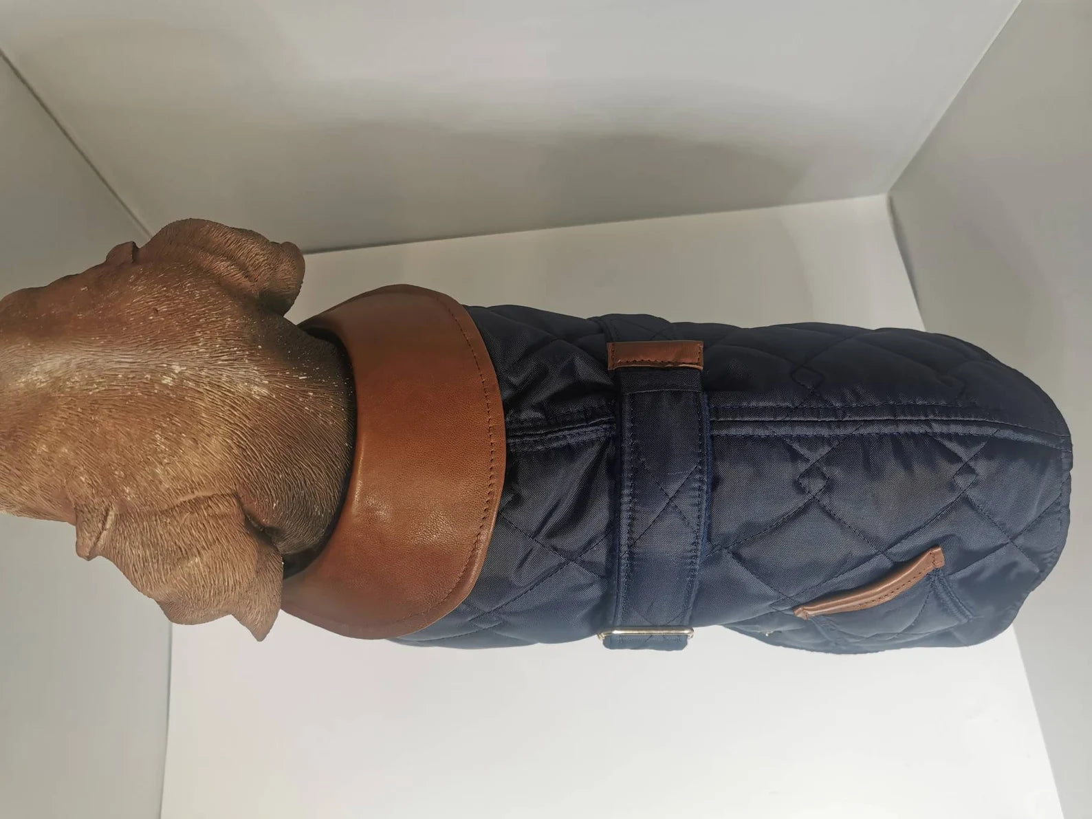 Navy blue quilted dog coat with genuine leather trims